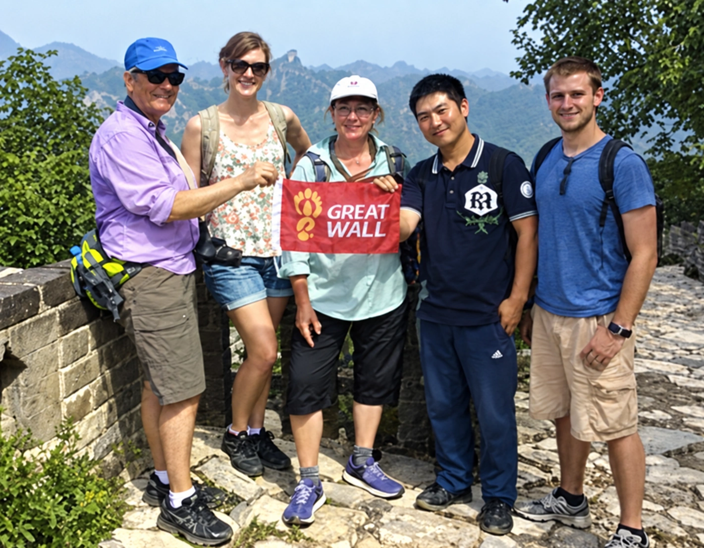 Restored archival Great Wall tour photo labeled Justin W.
