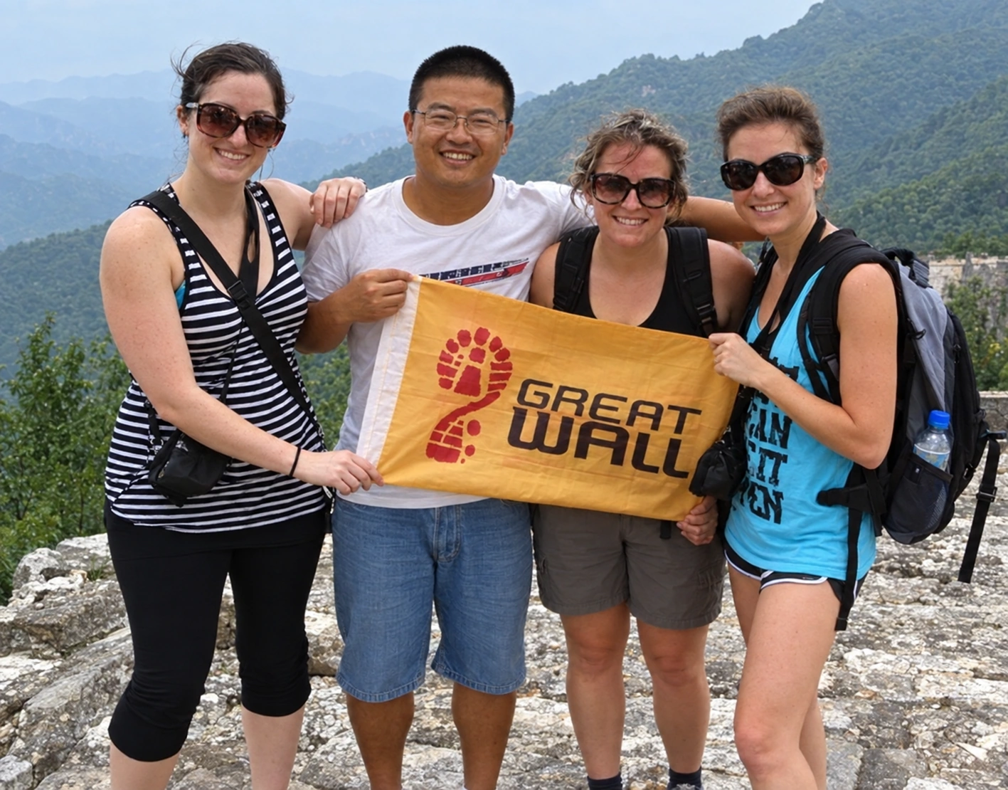 Restored archival Great Wall tour photo labeled Oliver Z.